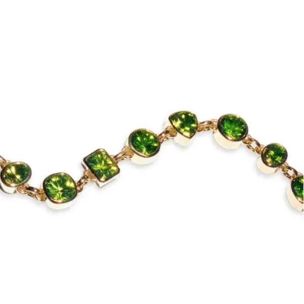 Ladies emerald shine bracelets -Yellow gold bracelet with bezel set peridot in multiple shapes