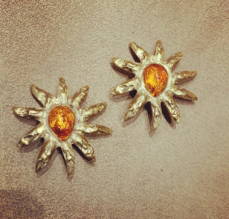 ladies gem earrings family themes -Edouard Rambaud starburst orange clip on earrings