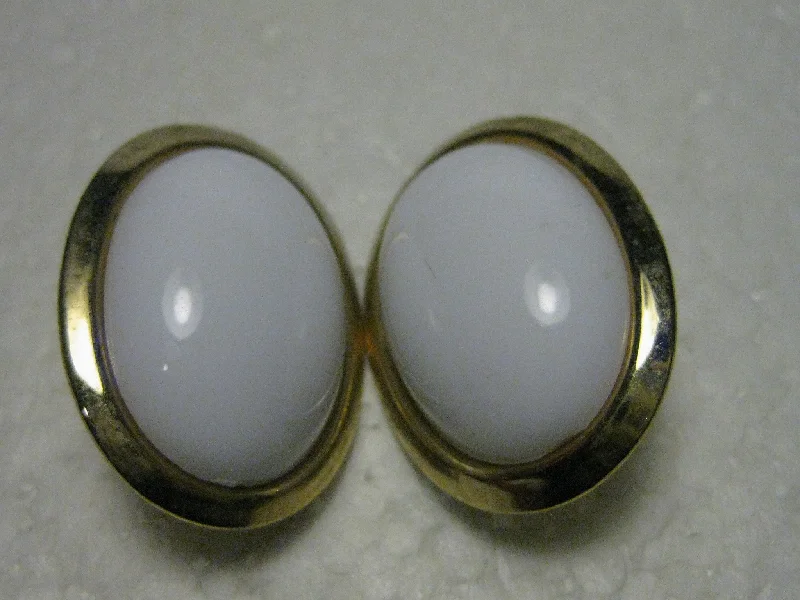 ladies earrings scalloped edges -Vintage 1970's/80's Goldtone Large Oval Clip Earrings with White Domed Center, 1.25"