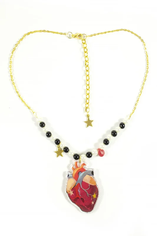 Cosmic spark necklaces -Twisted Circus Heart Necklace