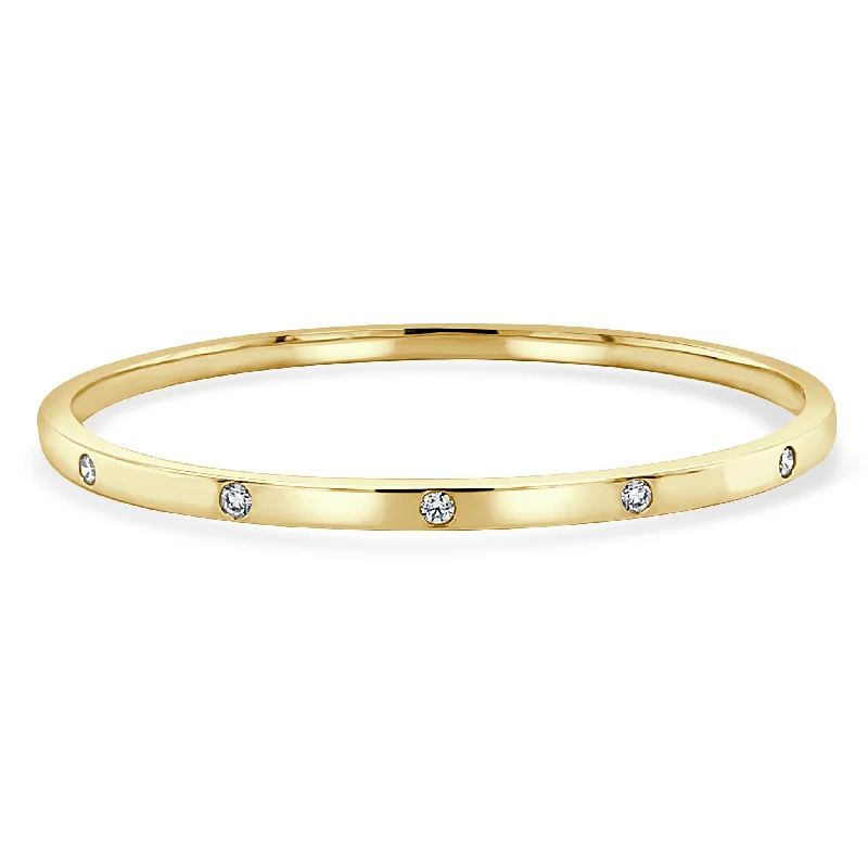 Ladies sibling shine bracelets -14K YG BEZEL DIAMOND BANGLE 0.